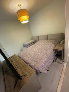 Postel nebo postele na pokoji v ubytování Le Convivial