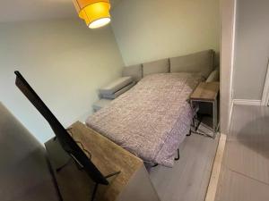 Postel nebo postele na pokoji v ubytování Le Convivial