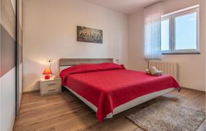 Postel nebo postele na pokoji v ubytování Three-Bedroom Apartment In Barban