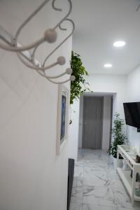 TV a/nebo společenská místnost v ubytování B&B Carpe Diem