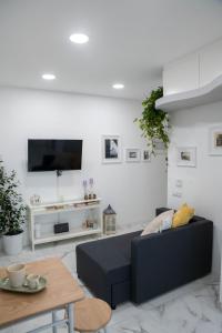 TV a/nebo společenská místnost v ubytování B&B Carpe Diem + 36 fotografií
