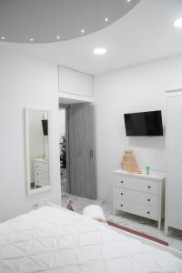 TV a/nebo společenská místnost v ubytování B&B Carpe Diem