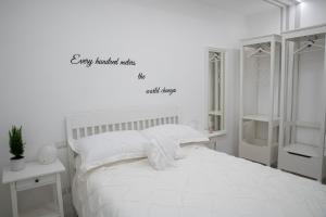 Postel nebo postele na pokoji v ubytování B&B Carpe Diem