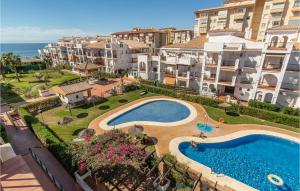 The swimming pool at or close to 2 Bedroom Nice Apartment In Torrox Még 29 kép