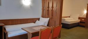 Postel nebo postele na pokoji v ubytování Hotel Garni Belvedere