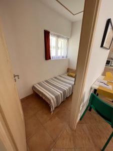 Posteľ alebo postele v izbe v ubytovaní Wash House Apartman