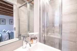 a bathroom with a sink and a shower at Chalet Gaia in Chamonix-Mont-Blanc