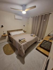 Ένα ή περισσότερα κρεβάτια σε δωμάτιο στο Villa Isabella
