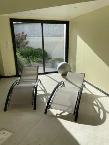 Posedenie v ubytovaní Studio cosy avec en option piscine accessible de avril à octobre
