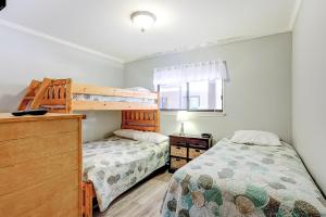 a bedroom with two bunk beds and a dresser at HH Beach & Tennis 7A in Hilton Head Island