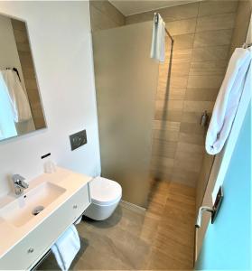Koupelna v ubytování Hotel Skivehus