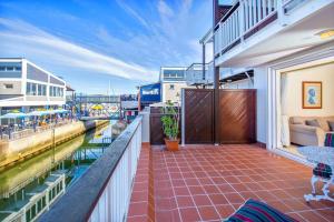 a balcony with a view of the water at Sheer Nest in Knysna