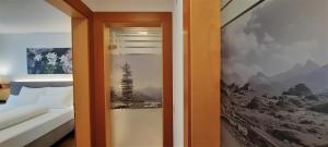 Postel nebo postele na pokoji v ubytování Hotel Garni Belvedere