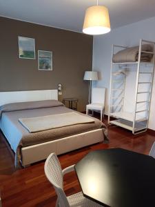 Postel nebo postele na pokoji v ubytování B&B Giulio Cesare