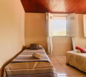 Vila das Estrelas - Guesthouse客房内的一张或多张床位
