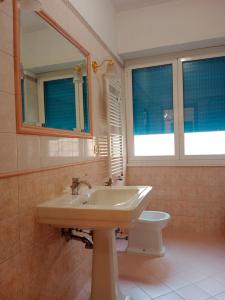 Koupelna v ubytování San Pietro Holiday Apartment