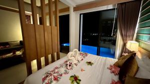 Postel nebo postele na pokoji v ubytování Aonang Phu Dahla Private Pool & Sea View - SHA Plus