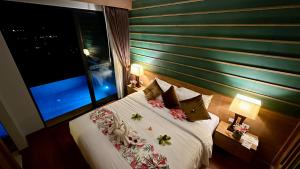 Postel nebo postele na pokoji v ubytování Aonang Phu Dahla Private Pool & Sea View - SHA Plus