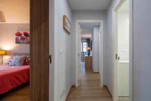 Postel nebo postele na pokoji v ubytování Ponferrada Castillo