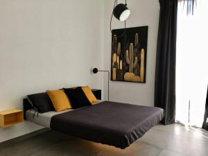 Sunshine Luxury Apartment - Ognina Catania 객실 침대