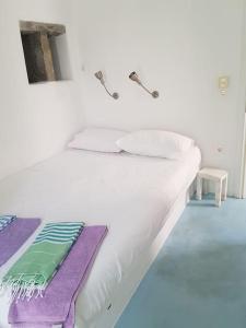 Posteľ alebo postele v izbe v ubytovaní Octopus House