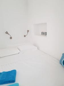 Postel nebo postele na pokoji v ubytování Octopus House