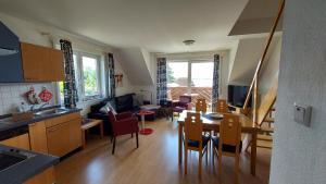 Kuchyň nebo kuchyňský kout v ubytování Ferienwohnung Weitblick Breege