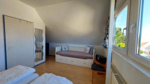 Postel nebo postele na pokoji v ubytování Ferienwohnung Weitblick Breege