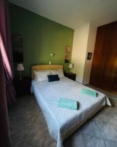Postel nebo postele na pokoji v ubytování Villa Domenico