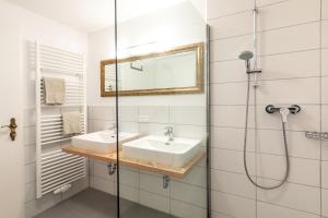 Łazienka w obiekcie Appartements DAS RETTENBACHER