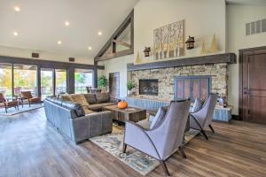 a living room with a couch and a fireplace at Scenic Eden Gem with Hot Tub about 6 Mi to Ski Area in Eden