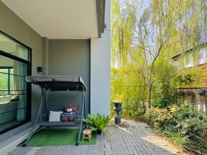 Photo de la galerie de l'établissement 清迈二环精装修温馨四卧三卫学区房别墅wifi院子停车位, à Chiang Mai