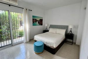 A bed or beds in a room at Villa Scenic with Private Pool - Sleeps 8 Még 22 kép