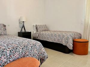 A bed or beds in a room at Villa Scenic with Private Pool - Sleeps 8