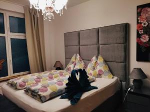 Postel nebo postele na pokoji v ubytování XuBa ApartmentRooms Messe Wien Prater