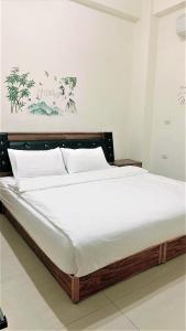 Postel nebo postele na pokoji v ubytování Sanli B&B