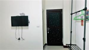 TV a/nebo společenská místnost v ubytování Sanli B&B