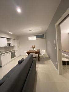 A kitchen or kitchenette at MATE' APARTMENTS - FREE WIFI & AIR CONDITIONAL - Molfetta, Puglia, Italy