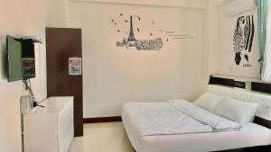 Postel nebo postele na pokoji v ubytování Sanli B&B