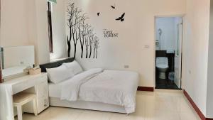 Postel nebo postele na pokoji v ubytování Sanli B&B