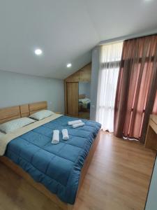 Postel nebo postele na pokoji v ubytování Cottage in Racha Mero