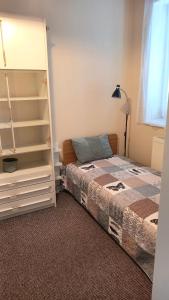 Posteľ alebo postele v izbe v ubytovaní Chill Apartman Hévíz