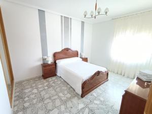Postel nebo postele na pokoji v ubytování La Mejana + 8 fotografií