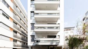 two different views of a building at Beautiful 2BDR close to Bialik Place by HolyGuest in Tel Aviv
