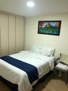 Katil atau katil-katil dalam bilik di Departamento Barbosa Santander 301