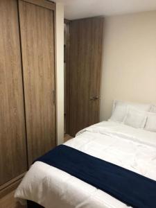 Katil atau katil-katil dalam bilik di Departamento Barbosa Santander 301