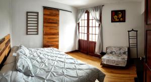 Letto o letti in una camera di Minka Hostel