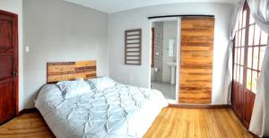 Letto o letti in una camera di Minka Hostel