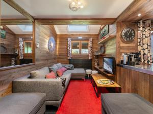 Część wypoczynkowa w obiekcie Duplex Moderne à Méribel : Ski aux Pieds, Piscine et Spa Inclus - FR-1-566-55