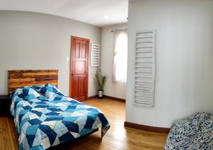 Letto o letti in una camera di Minka Hostel